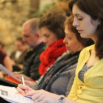 MFA Students at a lecture