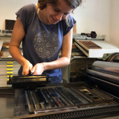 Students printing on a press