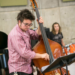 Student playing stand-up bass