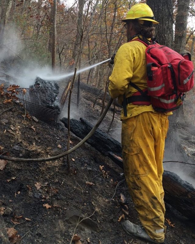 Warren Wilson College Forest Manager Shawn Swartz heads off campus to fight a fire on Bee Tree Road in Swannanoa last November.