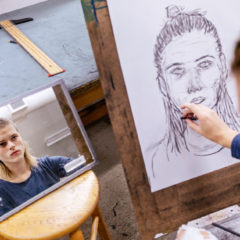 Student in drawing class