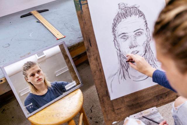 Student in drawing class