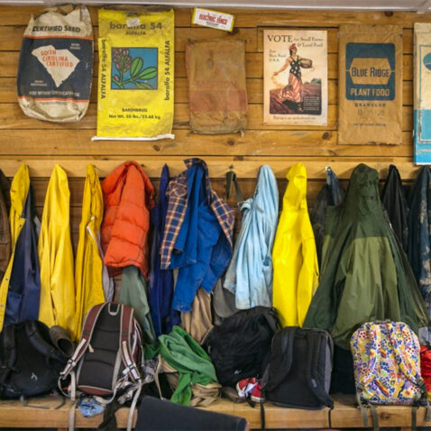 a large number of Coats hanging in the Farm Office