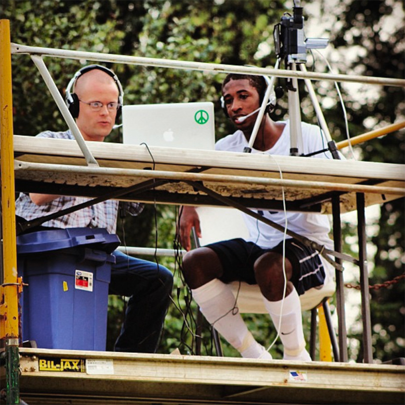 Students keep the score at a game