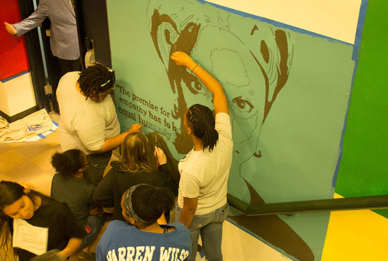 students paint a mural in Sunderland