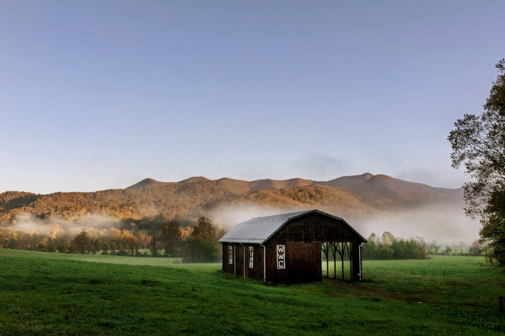 Campus scene with red barn