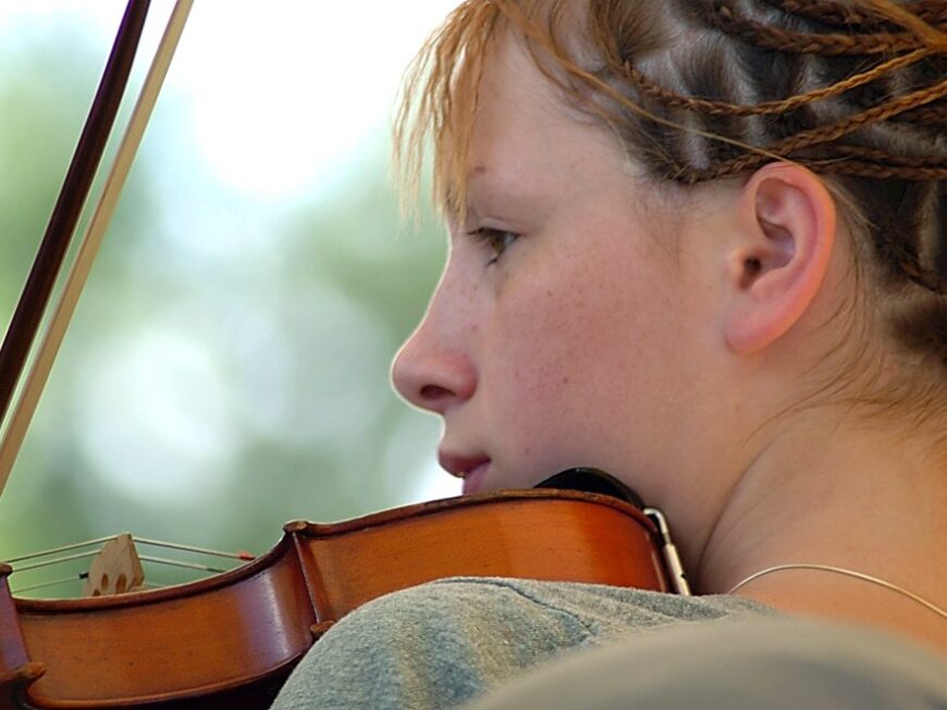 Girl playing a fiddle