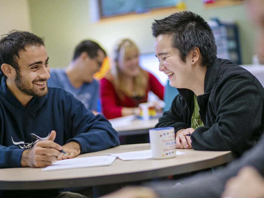 students discuss work