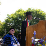 Paddington Mbumbgwa delivers his student speech at commencement.