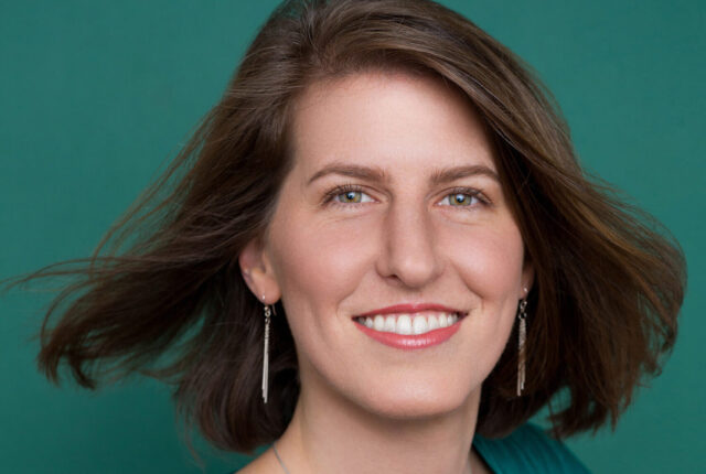 Clary Franco, COO Sugar Hollow Solar, stands smiling