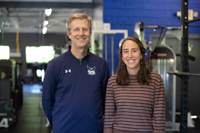 Psychology Professor Bob Swoap and Alum Marisa Romeo '15 stand smiling for a picture.