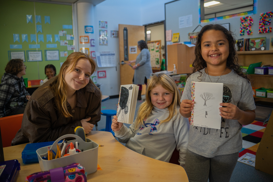 A WWC student helps local elementary school students catch up to their reading goals in the Freshman Seminar - Inspiring Kids as Readers.