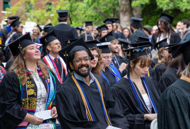 Students sitting at commencement