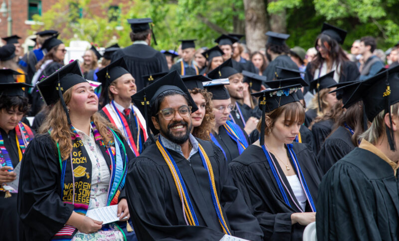 Students sitting at commencement
