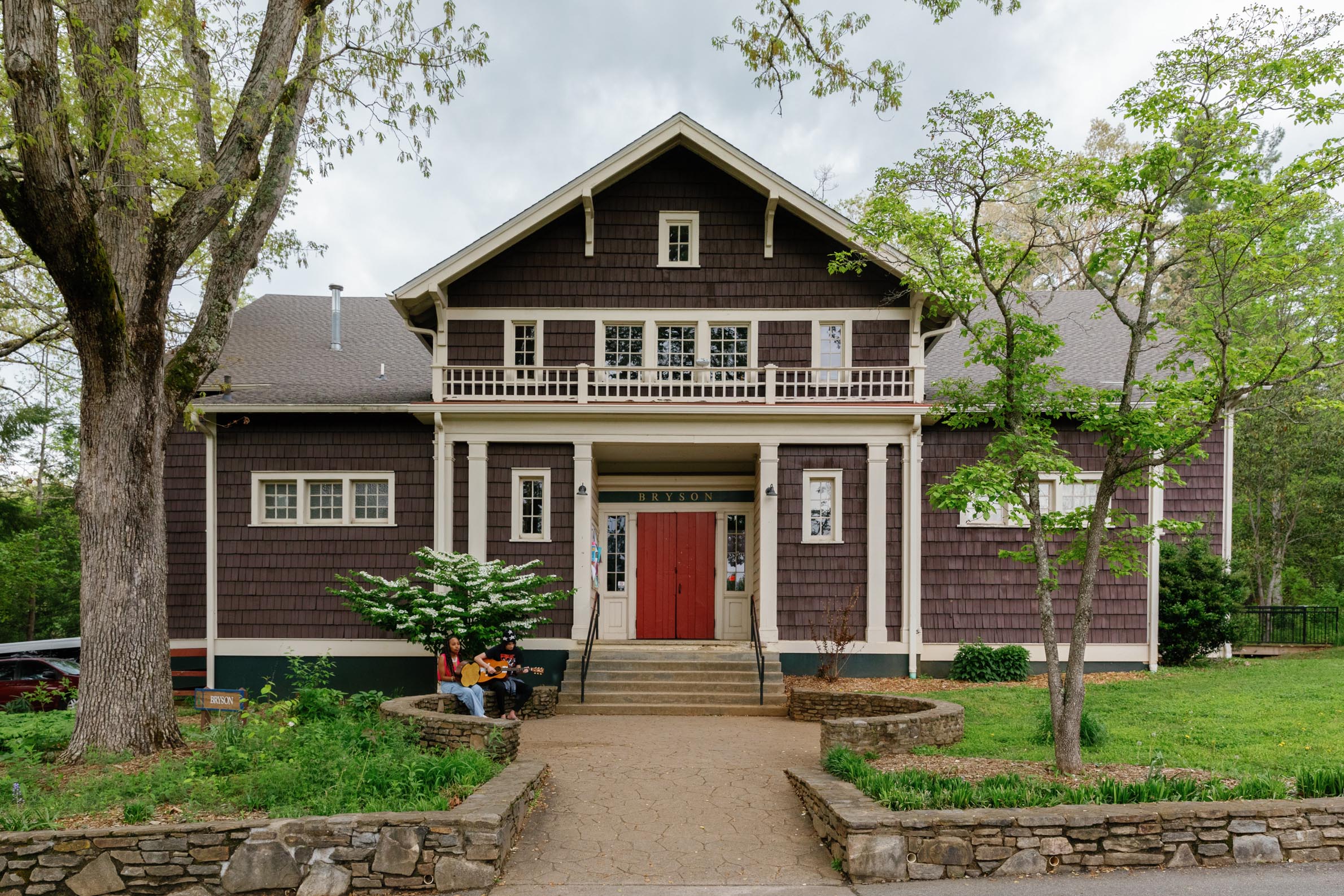A picturesque photo of bryson gym in the spring. The brown wooden gym is two stories and is the oldest wooden gym east of the Mississippi.