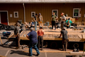 students working on tiny home construction