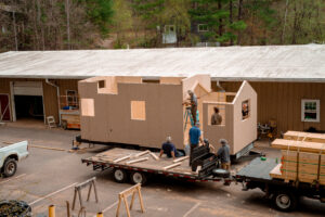 students working on tiny home construction