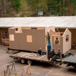 students working on tiny home construction