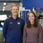 Psychology Professor Bob Swoap and Alum Marisa Romeo '15 stand smiling for a picture.
