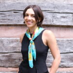 Visiting Assistant Professor of English and Communication Sarah Sgro stands smiling for a picture.