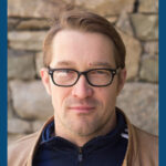 A headshot with a blue border of Dr. Jay Miller.