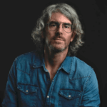 Assistant Professor of Art, Johnathan Durham, poses for a headshot photo